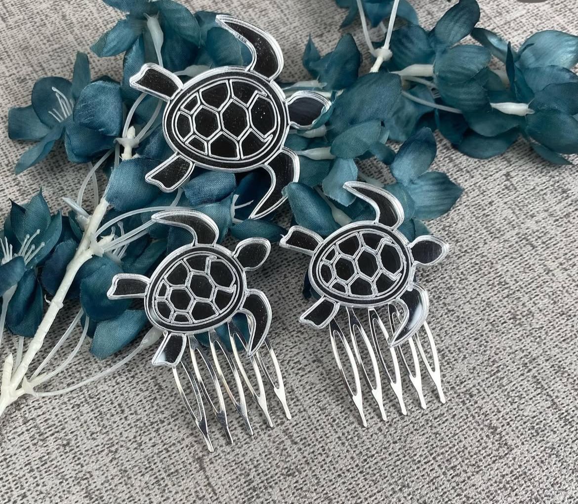 Conjunto de broche con peinas tortugas