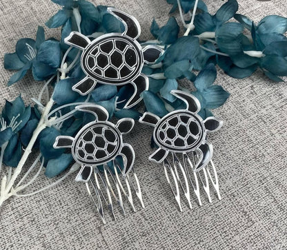 Conjunto de broche con peinas tortugas
