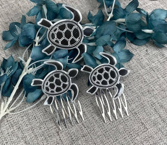 Conjunto de broche con peinas tortugas